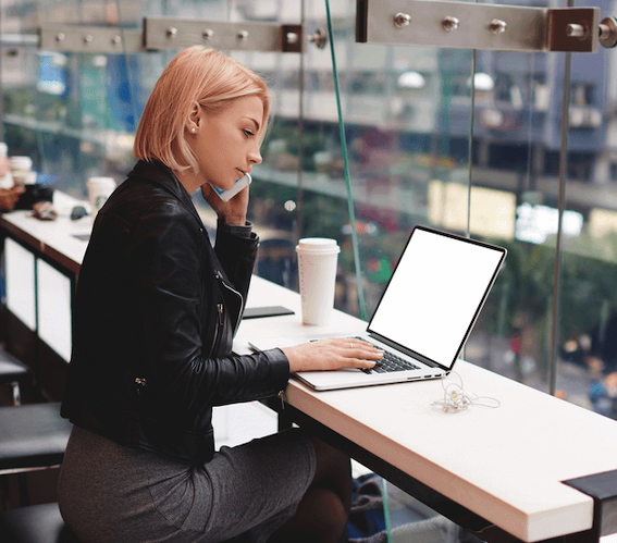 Woman working remote in the age of vulnerability management